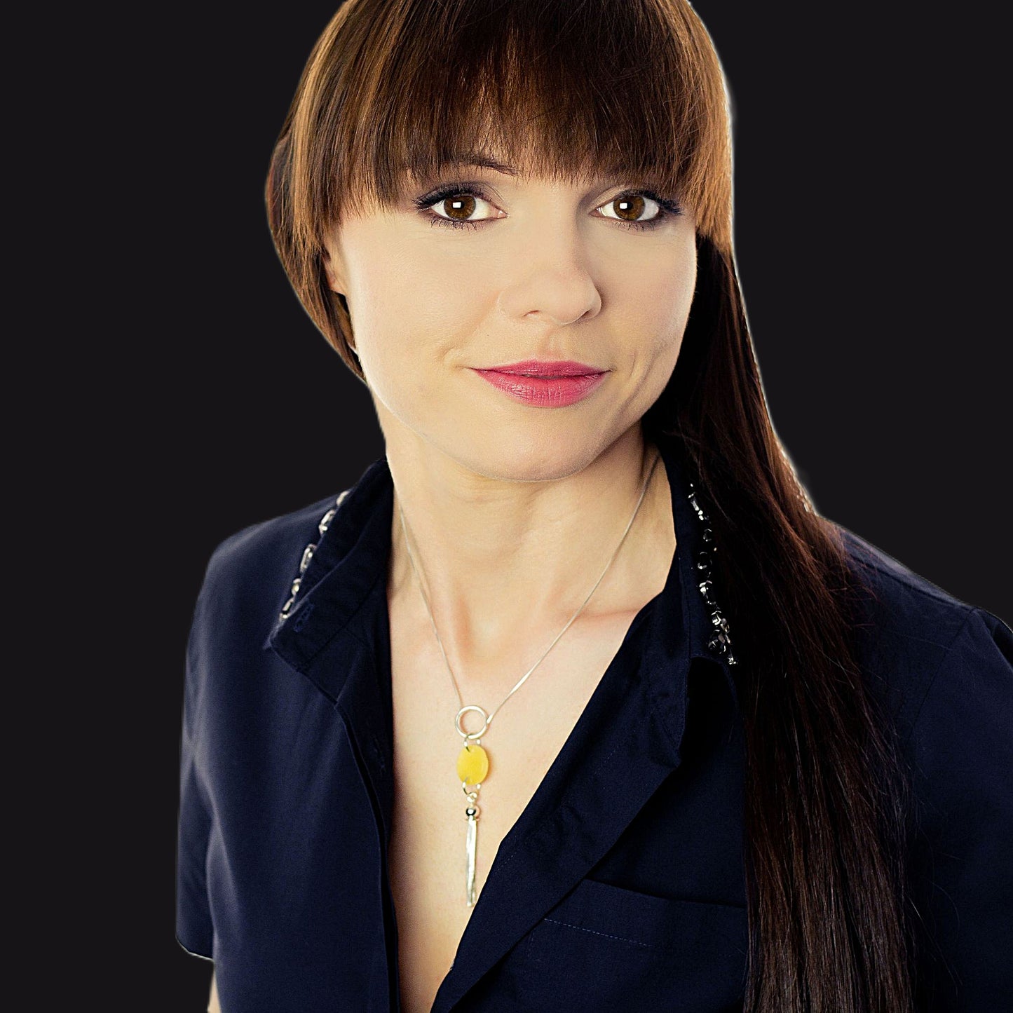 Handcrafted sterling silver necklace with round yellow Baltic amber disc and modern silver tassel