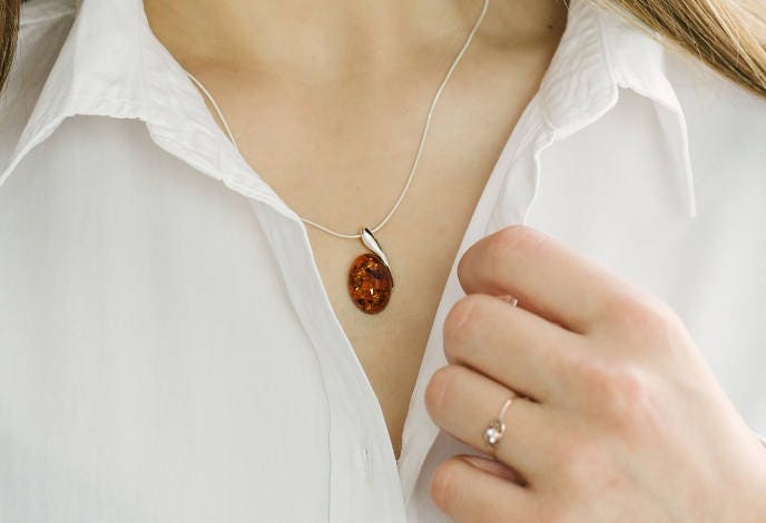 Delicate Amber Silver Pendant