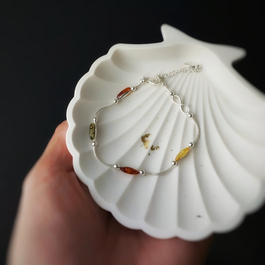 Sterling silver 925 bracelet with natural Baltic amber in lemon, green and cognac colors